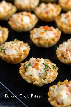 baked crab bites on a baking tray ready to be eaten