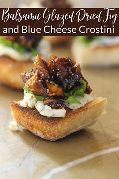 bread topped with blue cheese and other toppings on a table next to the words balsami glazed drop - top and blue cheese crostini