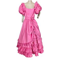 Gorgeous Vintage 1970's Pink Tiered Lace Trim, Tulle Lined, Puff Bubble Sleeve, On/Off Shoulder, Medieval Victorian Southern Belle Princess Ball Gown Dress, Gathered At The Hip With Rosette Applique, Low V-Back, Hidden Rear Zipper Closure, Size Is Marked 11 Fits A Modern Medium, Large, Xl Depending On Your Measurements Please Refer To Measurements For Accurate Fit. *Please Note I Used A Crinoline To Puff The Skirt Of The Dress, This Crinoline Is Not Included In The Sale Approximate Measurements Taken With Item Laying Flat Armpit To Armpit:19" Waist:13" (Measured Higher Top Of Waist, At The Seam) Hips: Free Shoulder To Hem:62" *Great Gently Used Item, This Item Is Used Vintage And May Hav Belle Princess, Ball Gown Dress, Princess Ball Gowns, Bubble Sleeve, Southern Belle, Ball Gown Dresses, Gown Dress, Xl Dress, True Vintage