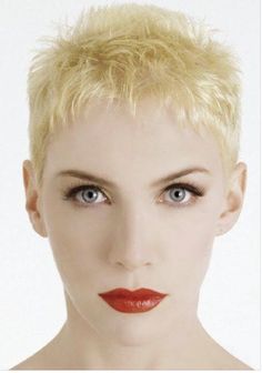 a woman with blonde hair and red lipstick