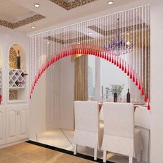 a dining room with red and white decorations