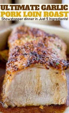 an image of pork roast on a plate with text overlay that reads, ultimate garlic pork loin roast showtopper dinner in just 5 ingredients