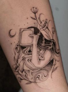 a woman's arm with a tattoo design on it