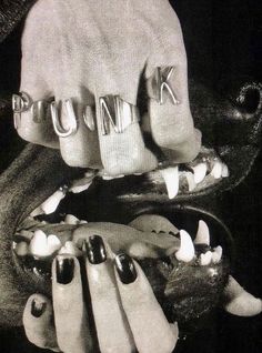 black and white photograph of woman's hands with fake teeth