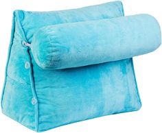 a blue pillow sitting on top of a white background