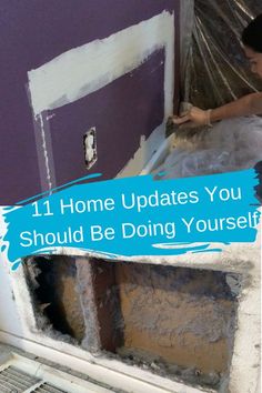 a woman is painting the walls in her house with purple paint and white trim on it