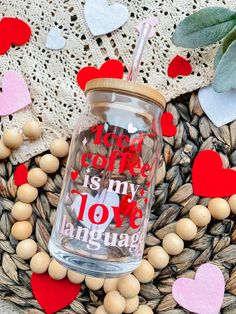 there is a glass jar with the words love on it