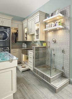 a washer and dryer in a small room