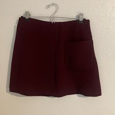 Burgundy/Maroon Mini Skirt. Never Been Worn. Still Has Tags. High Waisted With Side Zipper. Perfect Holiday Party Skirt! Burgundy Mini Skirt With Lined Detail, Burgundy Lined Mini Skirt, Burgundy Mini Skirt With Lining, Casual Burgundy Mini Skirt, Chic Burgundy Lined Skirt, Chic Burgundy Skirt For Work, Chic Burgundy Skirt For Spring, Chic Burgundy Skirt For Night Out, Burgundy Skirt For Fall