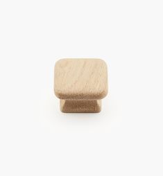 a wooden knob on a white background