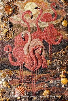 an art work made out of beads and seashells with flamingos on it