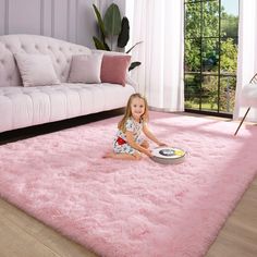 PRICES MAY VARY. Fluffy Velvet Rug: The 5.3x7.5 pink area rug is made of velvet with a pile length of 1.78 inches, and the soft pile will keep you comfortable; There is a sponge pad inside, and good cushioning can protect your family's safety Little to No Shedding: Unlike other carpets on the market, this bedroom large area rug uses advanced tufting stitching technology to make it stronger and more durable, so you don't have to worry about the pile falling off Non-Slip Rubber Backing: The 5.3x7. Faux Cowhide Rug, Velvet Rug, Fuzzy Rug, Dorm Rugs, Kids Living Rooms, Carpets For Kids, Fur Carpet, Faux Fur Rug, Rugs For Bedroom