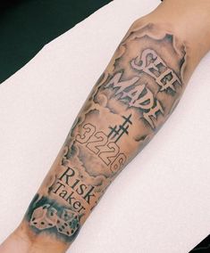 a person with a tattoo on their arm that reads see map, rise taker