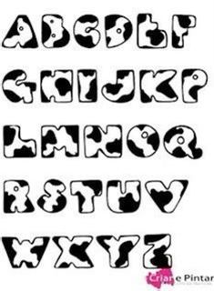 the alphabet is black and white with letters in different styles, including one that has been drawn