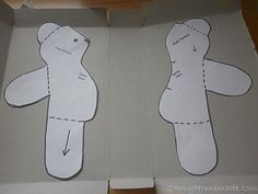 two open boxes with cut out teddy bears inside