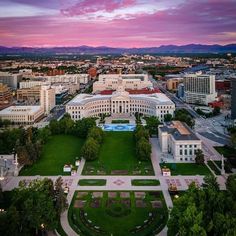 an aerial view of the capitol building in washington, d c at sunset or dawn