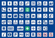 various white and green signs on a blue background, including buses, cars, people