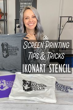 a woman holding up a t - shirt with the words screen printing tips and tricks on it