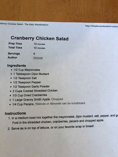 a menu for cranberry chicken salad on a table