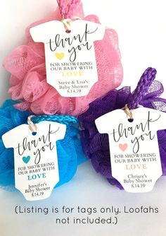 three baby shower balls with thank you tags on the top and one tag attached to them