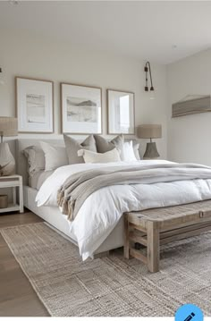 a large bed sitting in a bedroom on top of a wooden floor