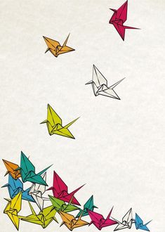 colorful origami birds flying in the sky