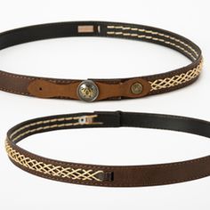 two brown leather belts with gold braiding on them