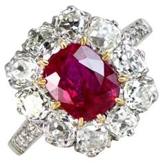 a large red and white diamond ring