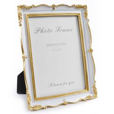 a white and gold frame with the words photo frame service size is $ 6 99