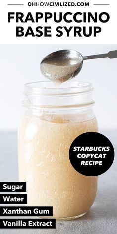 a jar filled with sugar next to a spoon and text that reads frapuccino base syrup