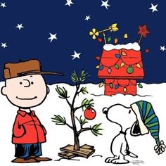 a charlie brown christmas card with a tree and a man standing next to a dog