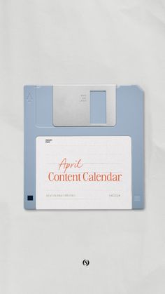 an apple content calendar is displayed on a white surface