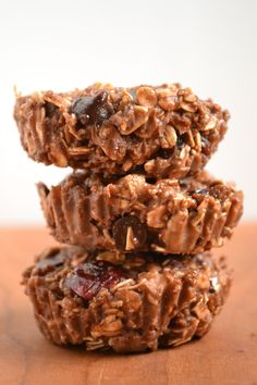 three cookies stacked on top of each other with chocolate chips and pecans in the middle