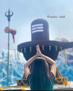 a woman is doing yoga in front of a large boat