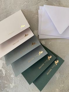 four folded thank you cards on top of each other