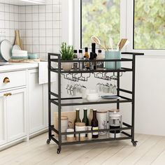 PRICES MAY VARY. The industrial bar cart is a durable, smooth rolling serving cart for your family's everyday needs.With great design and elegant gold tone, it is a wonderful gift for your friends or family. Our black bar carts can be ideal for living room, bedroom,kitchen or any other commercial or home uses.Whether it's for Valentine's Day, weddings or an engagement party in your friend's uptown apartment - we offer these elegant bar carts! This glass bar cart has 3 tier large storage shelves. Small Bar Cart, Carts On Wheels, Black Bar Cart, Kitchen Indoor Outdoor, Wine Rack Glass Holder, Bar Cart Design, Industrial Bar Cart, Wine Cart, Bar Serving Cart