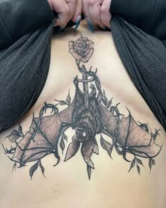 Bat Wrapped Around Wrist Tattoo, Gothic Tattoo Ideas Female, Horizontal Forearm Tattoo, Gothic Rib Tattoo, Spooky Butterfly Tattoo, Large Patchwork Tattoo, Bat Tattoo Sternum, Sternum Bat Tattoo, Goth Spine Tattoo