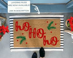 a door mat with the words ho hoo and poinsettis on it