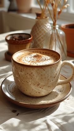 a cup of coffee sitting on top of a saucer