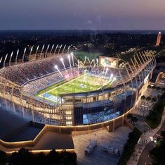 an aerial view of a stadium at night