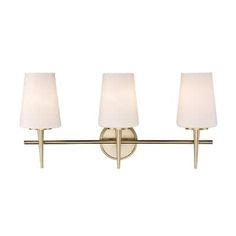 three light bathroom fixture with white shades on the sides and two lamps on each side