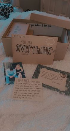 some cards are in a box on a white furnishing area, and there is an open card that says you are overthink