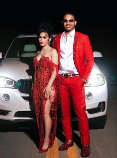 Red Prom Looks Black Couple, Silver Prom Ideas Black Couples, Silver And Red Prom Couple, Red Prom Outfits For Couples, Zulu Ball Gowns, Red Prom Dresses 2023, White Prom Dress Black Couple, Black And Red Prom Couple Black People, Red And Black Prom Couples