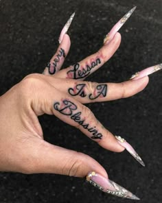 two hands with different designs on their fingers