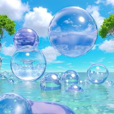 several soap bubbles floating in the air over water