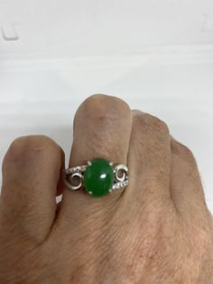 Vintage green nephrite jade Ornate German Silver ring, does not tarnish, NOT sterling Sizes 7, 8 or 9 All rings are shipped in a nice gift box. Check out our over a THOUSAND great reviews Engraving is $4 per letter and is not always perfect depending on the piece. It can take a few days if the jeweler is busy. This is payable to Paypal Judithsltd@gmail.com Green Cabochon Ring For Anniversary, Classic Green Jade Rings, Silver Jade Rings For Formal Occasions, Green Jade Promise Ring, Green Jade Rings For Promise, Formal Silver Jade Ring, Green Jade Anniversary Rings, Jade Ring For Anniversary, May Birthstone, Classic Silver Jade Ring