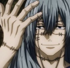 an anime character with blue hair holding his hand up