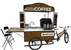 a coffee cart with a bike attached to it