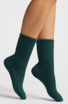 Crafted from a sumptuous cashmere blend, these luxurious crew socks keep your feet warm and snug both day and night. The ribbed-knit construction and fluffy feel make these socks perfect for wearing with shoes or lounging at home. Cashmere/polyester/spandex/angora Machine or hand wash, dry flat Imported Casual Cashmere Winter Socks, Casual Cashmere Socks For Winter, Day And Night, Crew Socks, Hosiery, Polyester Spandex, High Heel, Ribbed Knit, High Heels