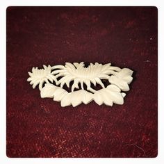 "This is a lovely vintage hand carved bone Chrysanthemum Floral motif brooch/pin.  This vintage carved bovine bone Chrysanthemum shaped brooch /pin measures about 2 3/8\" across and 1\" tall (at the tallest point) and it comes in half of its original box!  This lovely, vintage carved bone Chrysanthemum shaped brooch/pin is in very good condition and come from a fresh to market local estate.  Please check all of the pictures and zoom in to get a look the condition of the piece.  There is little d Chrysanthemum Jewelry, Vintage Chrysanthemum, Collection Decor, Carved Bone, Bone Carving, Unique Items, Chrysanthemum, Floral Motif, Brooch Pin